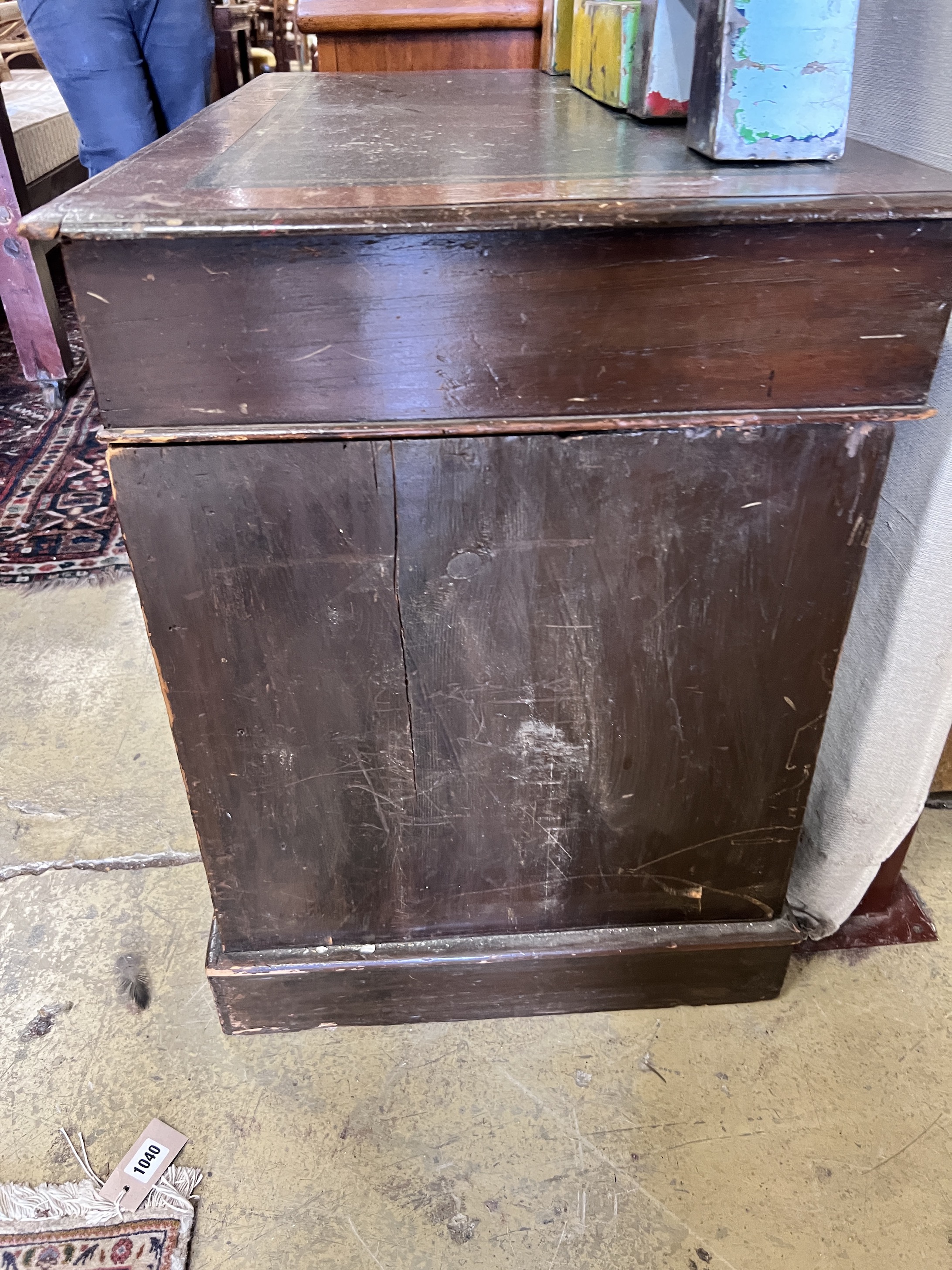 An Edwardian mahogany pine pedestal desk, width 104cm